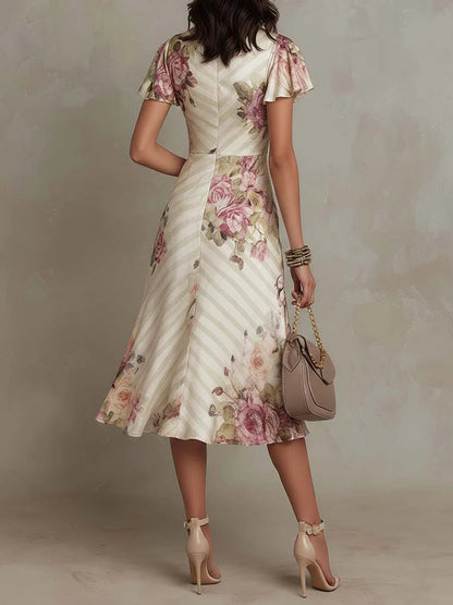 Alba | Abito midi in satin floreale