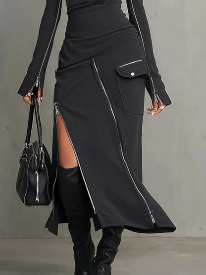 Completo con tasche zip irregolari e colletto alto